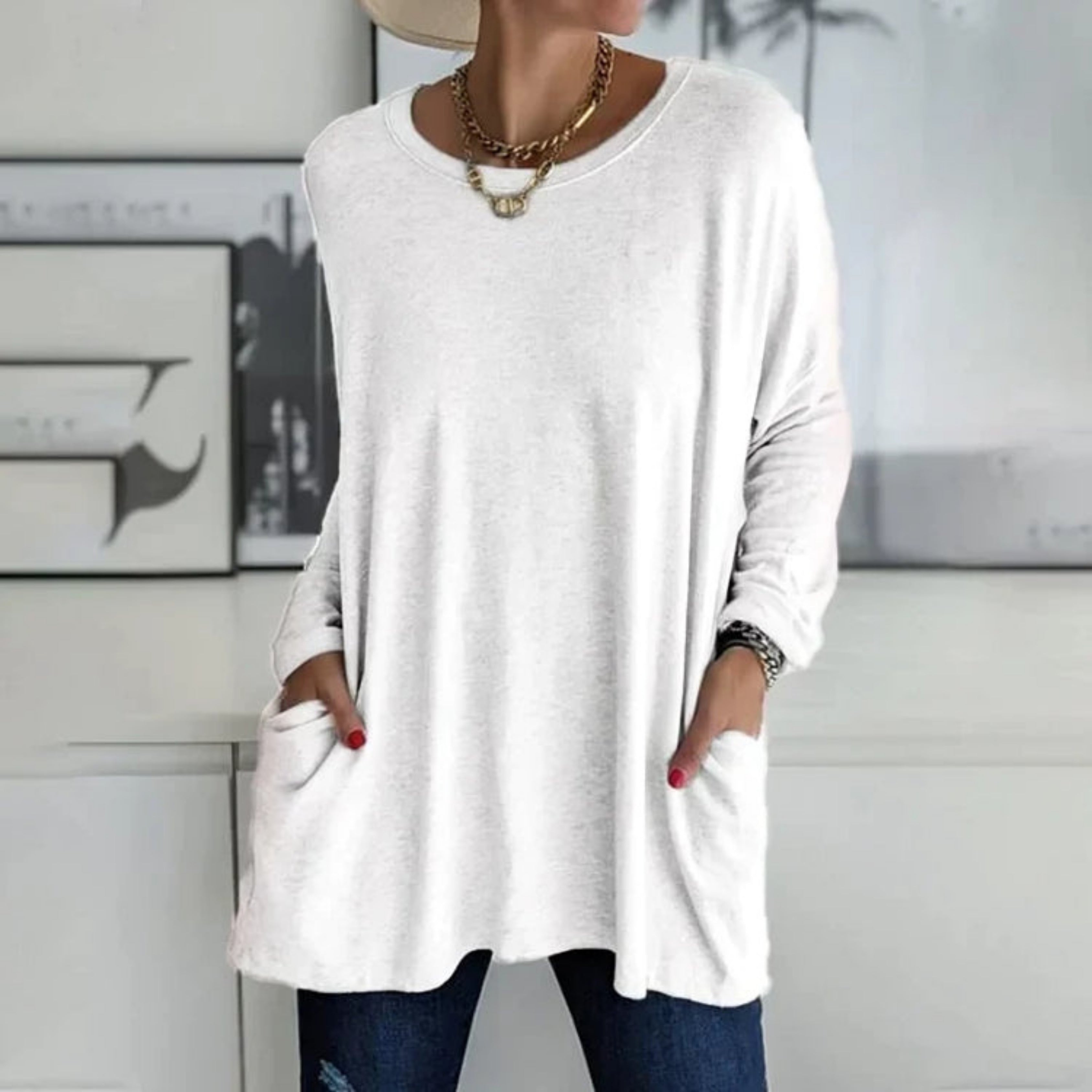 Elegant oversize-trøje med praktiske sidelommer