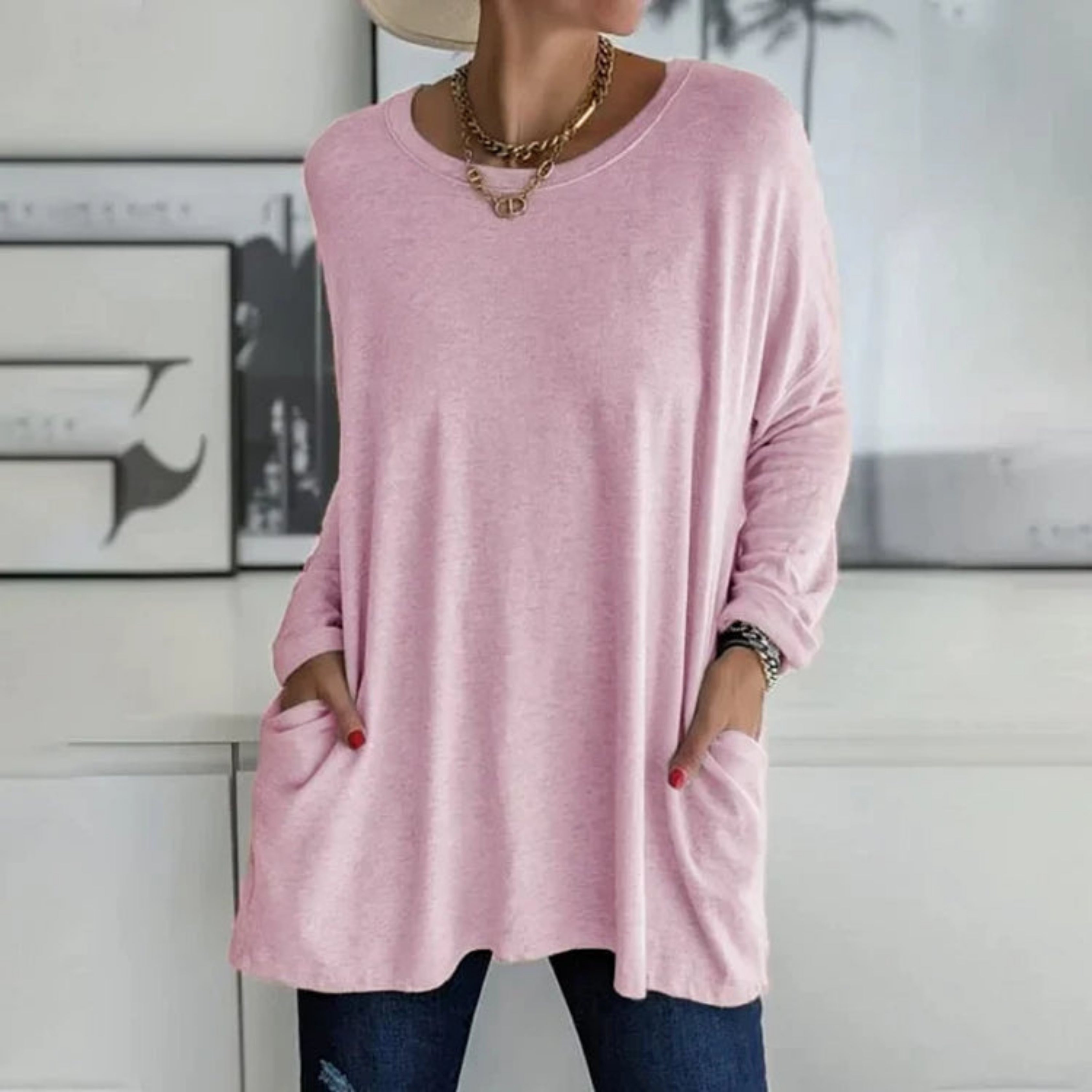 Elegant oversize-trøje med praktiske sidelommer