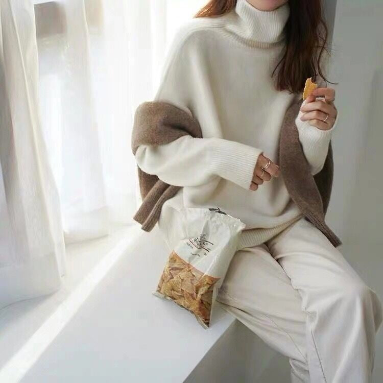 Løs rullekravesweater