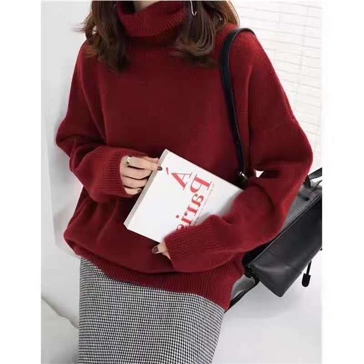 Løs rullekravesweater