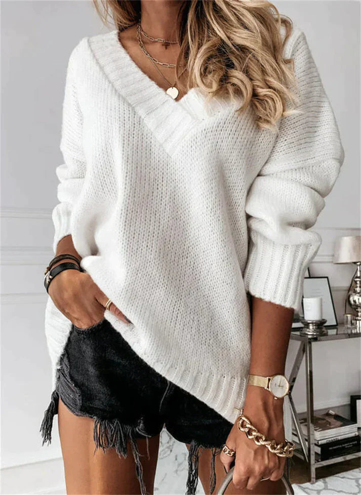 Elegante jersey de cuello de pico para mujer