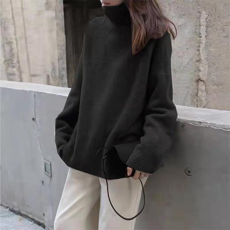 Løs rullekravesweater