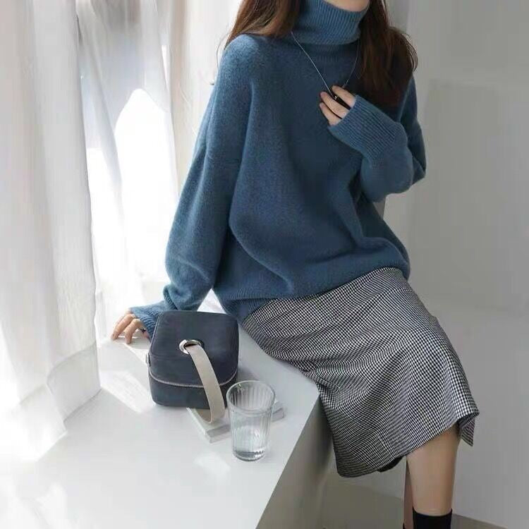 Løs rullekravesweater