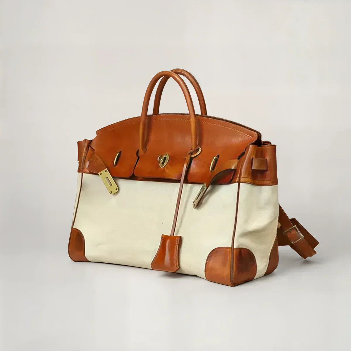 Leather Weekend Bag with Spill Resistant Canvas and Gold Tone Hardware | Durable Overnight Travel Bag for Short Trips