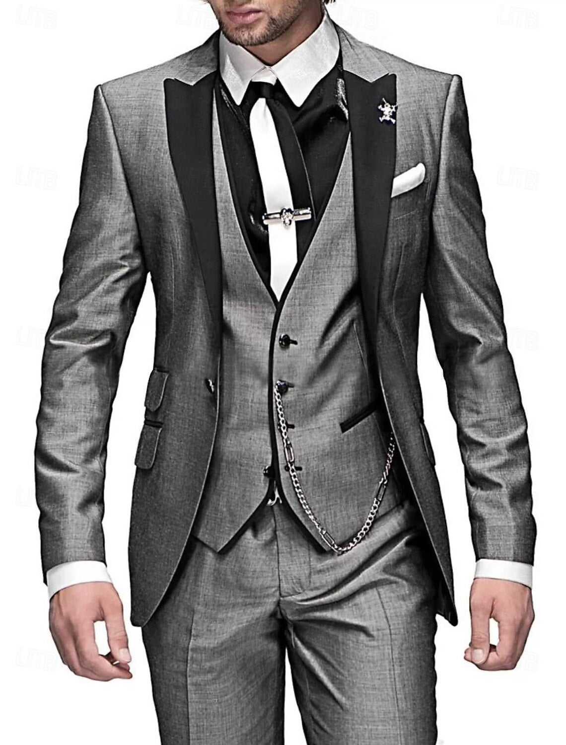 Perfectly tailored men's three-piece suit: blazer, waistcoat, trousers for a sharp, modern formal look.