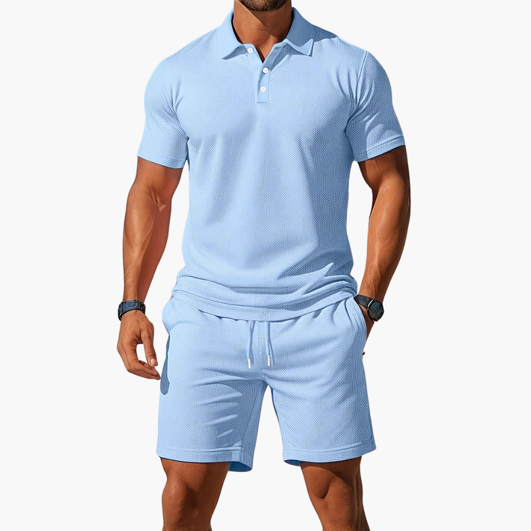 https://cdn.shopify.com/s/files/1/0943/0581/2804/files/mens-short-sleeve-polo-shirt-and-drawstring-shorts-2-piece-lounge-set-01.png?v=1775853795