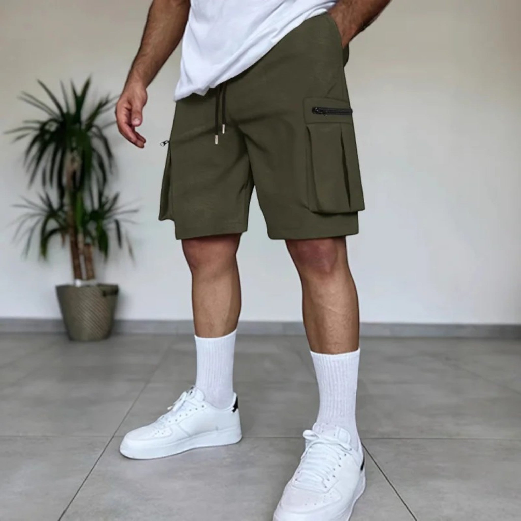 "Stoere lichtgewicht cargo shorts voor mannen, ademend katoenmix, meerdere zakken, ideaal voor zomeravonturen."