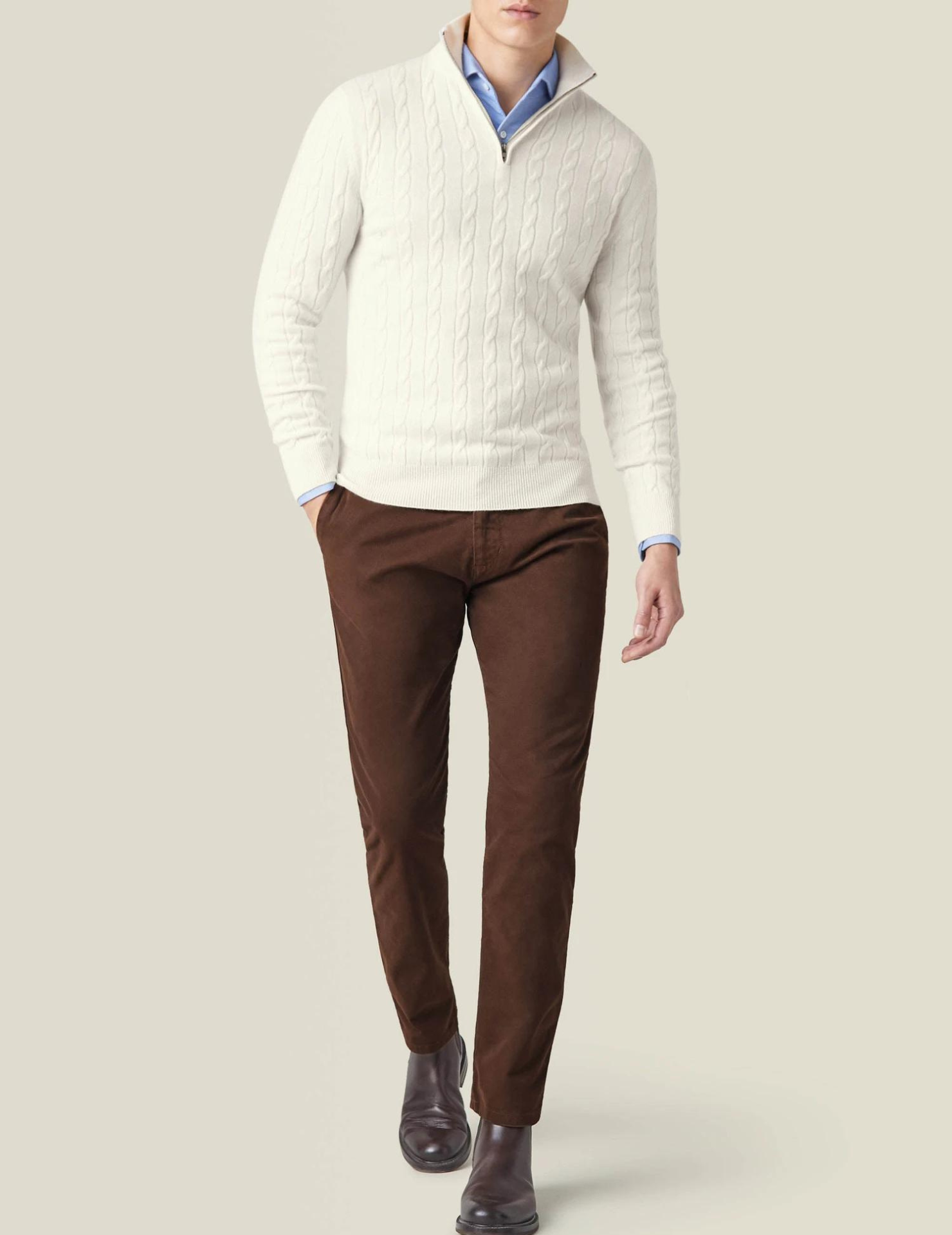 Elegante jersey de punto por cable con cremallera