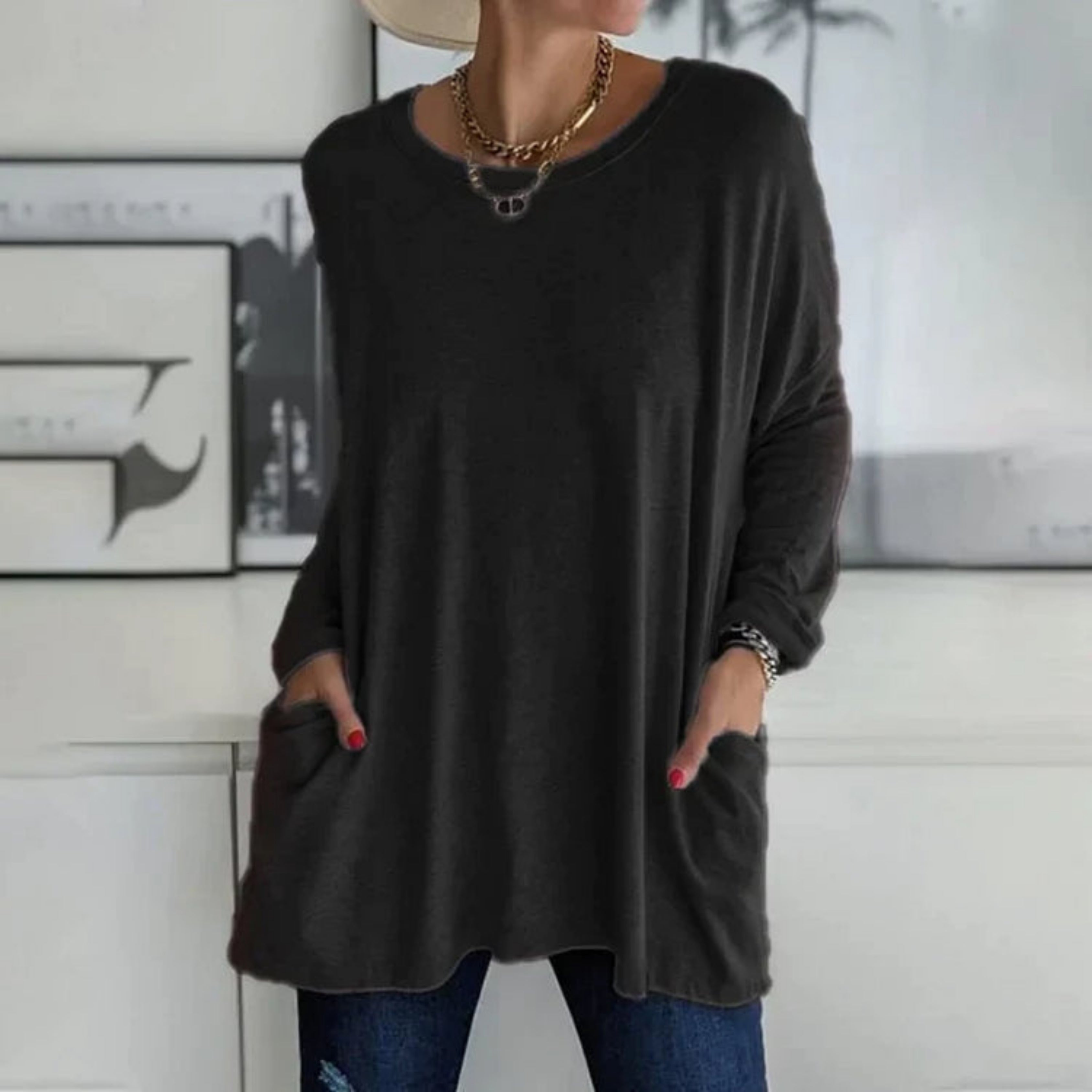 Elegant oversize-trøje med praktiske sidelommer