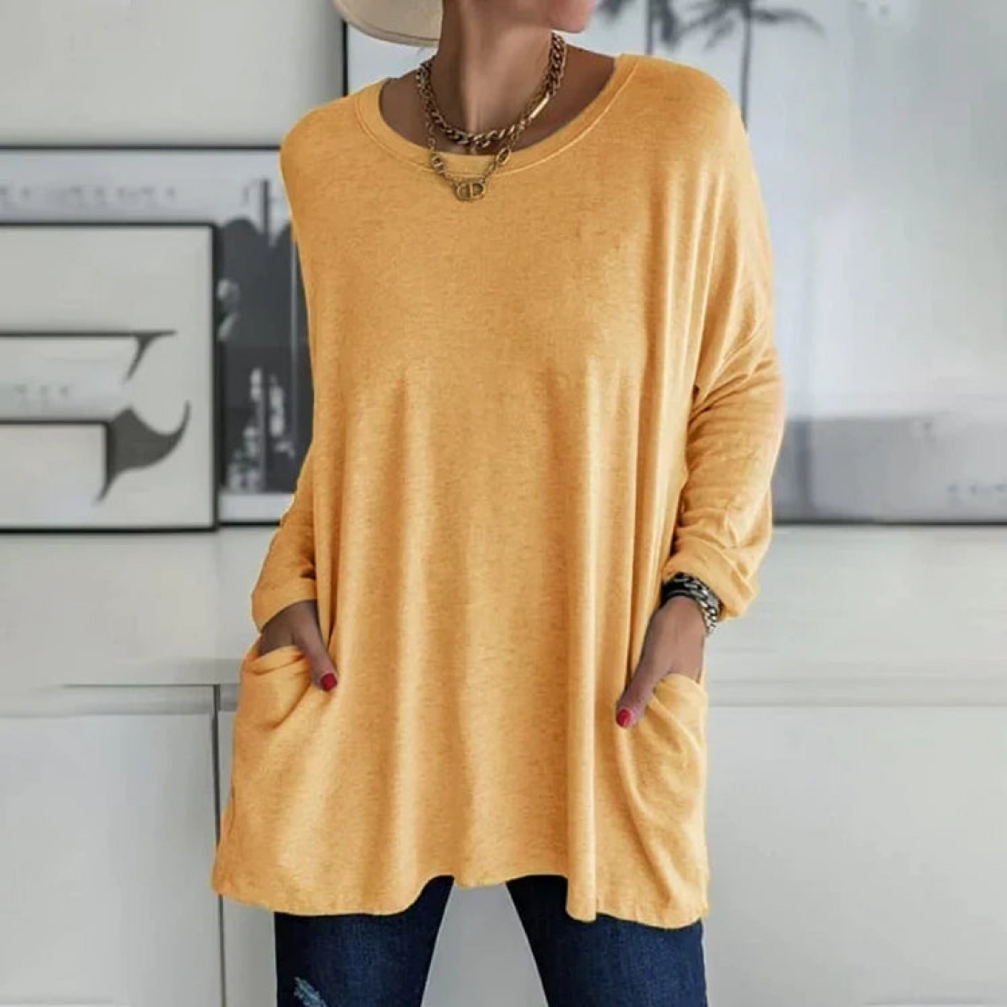 Elegant oversize-trøje med praktiske sidelommer