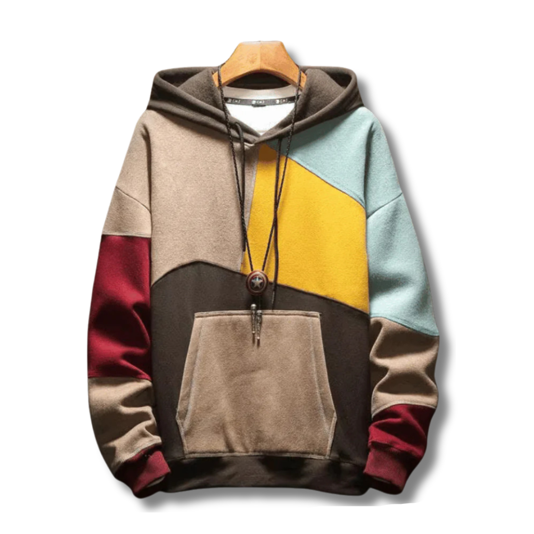 Felpa con cappuccio multicolore, design geometrico, tasca frontale, colori marrone, giallo, rosso e azzurro, moda casual uomo, abbigliamento autunnale.
