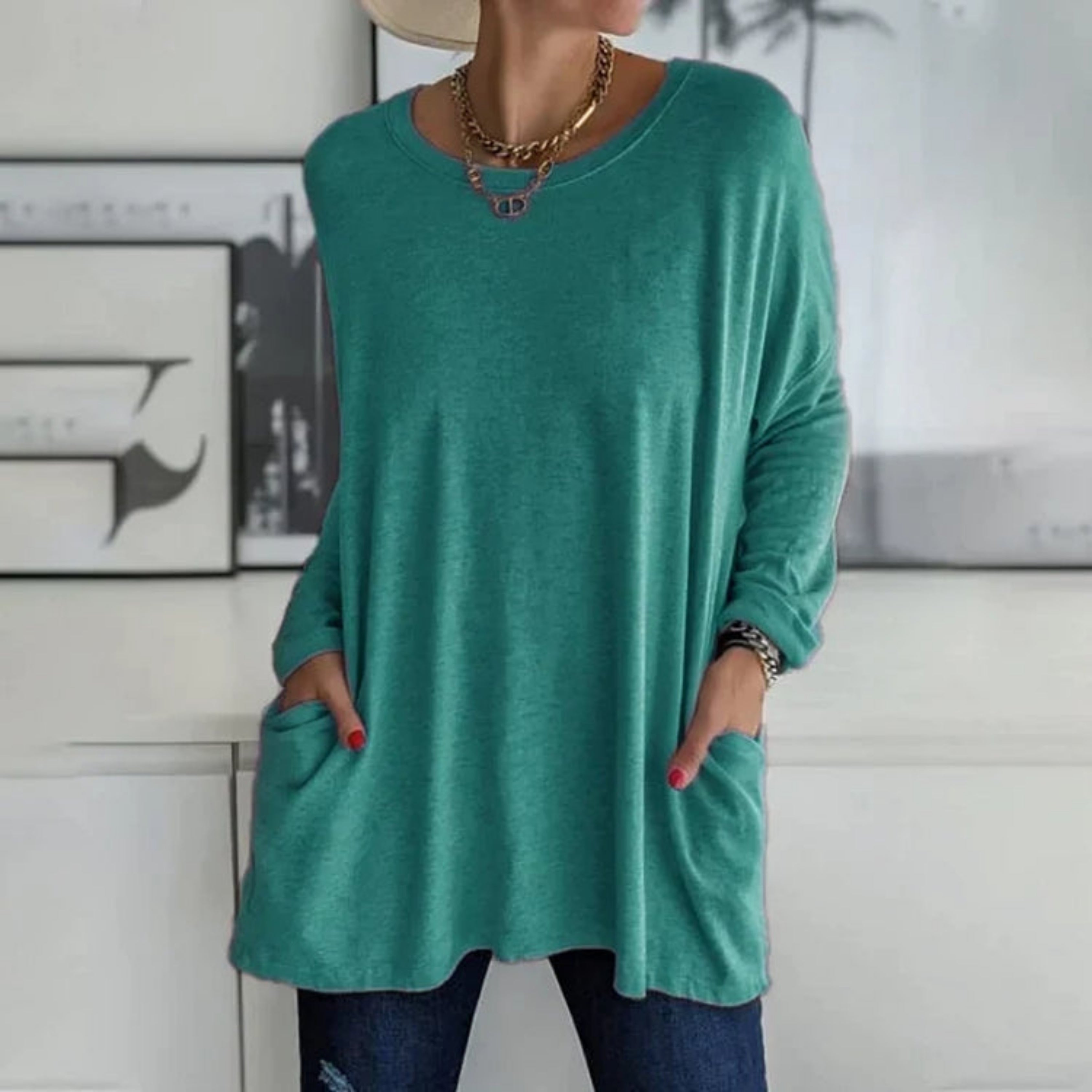 Elegant oversize-trøje med praktiske sidelommer