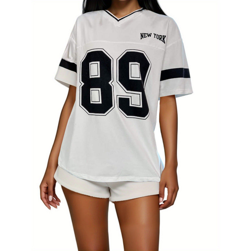White v-neck t-shirt with '89' and 'New York' graphic, front view