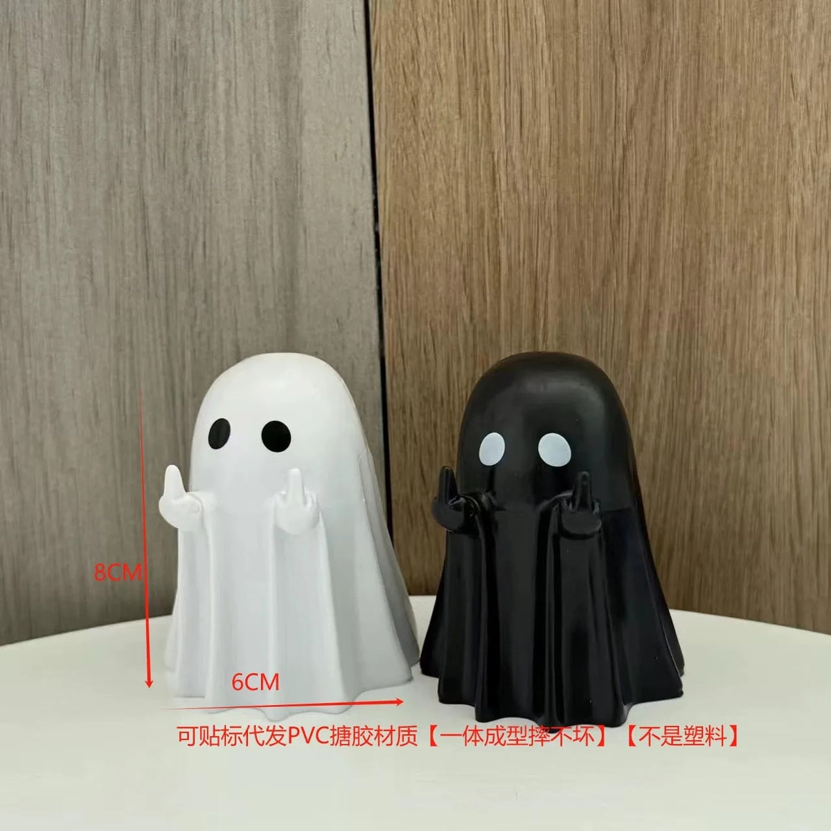 Vtipná halloweenská figurka ducha s prostředníčkem