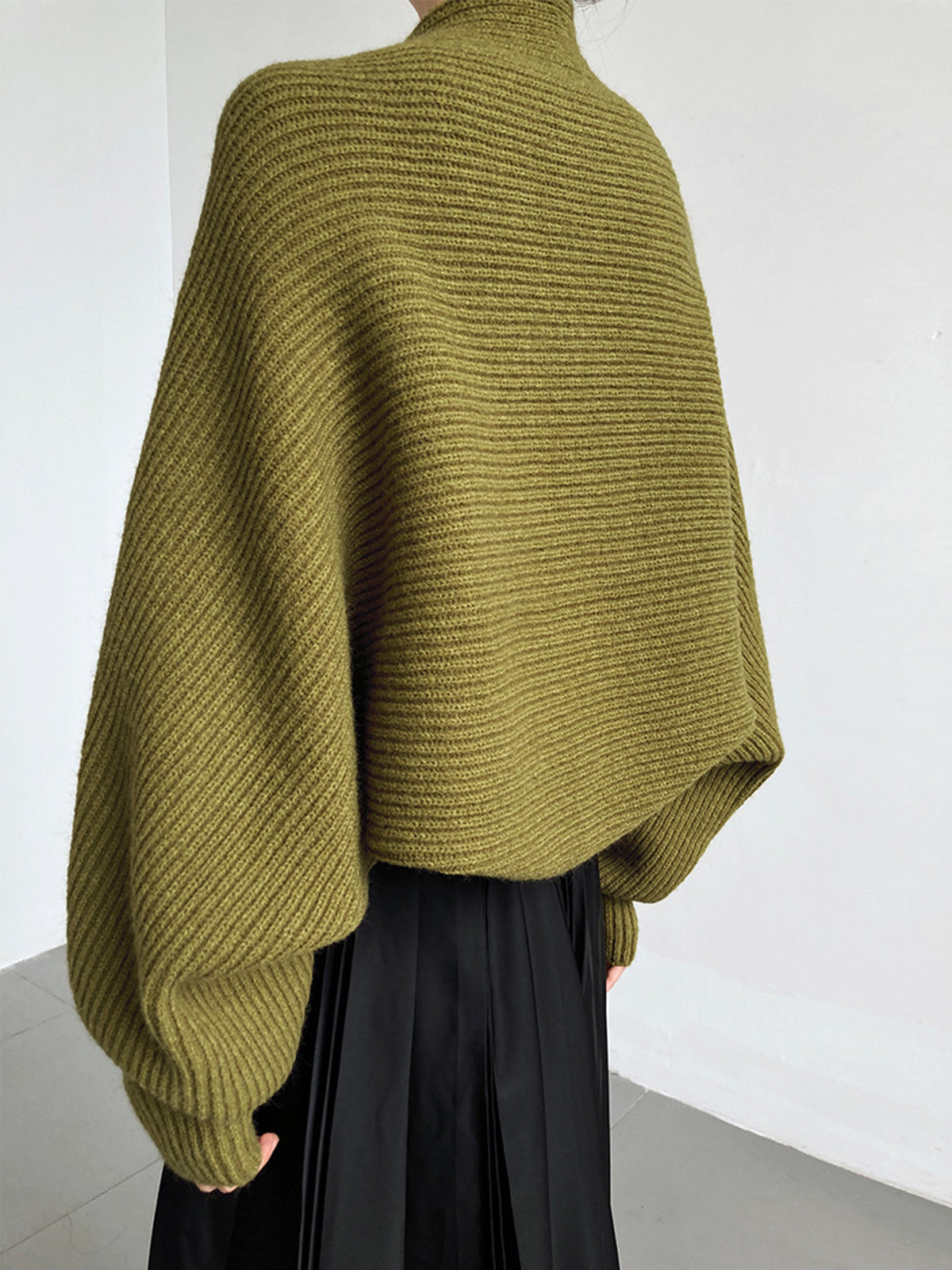 Olive green knit shrug with balloon sleeves back view