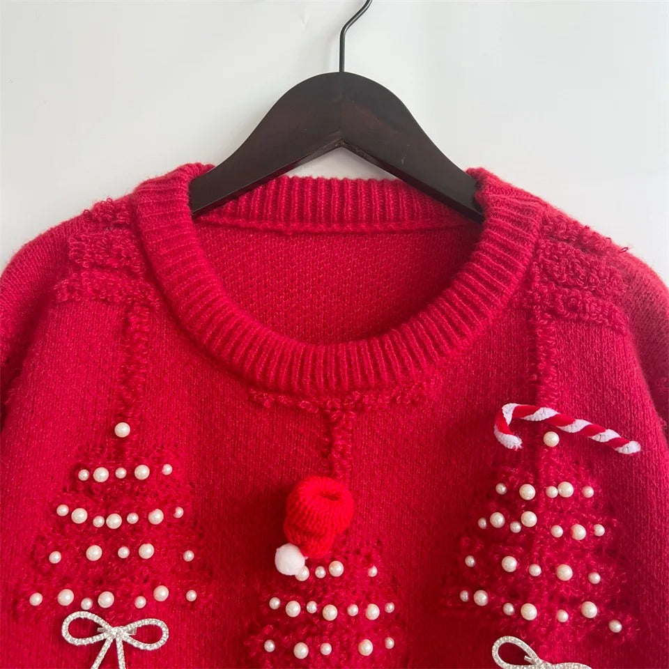 Rød julesweater til kvinder – med perledekorationer og sløjfedetaljer