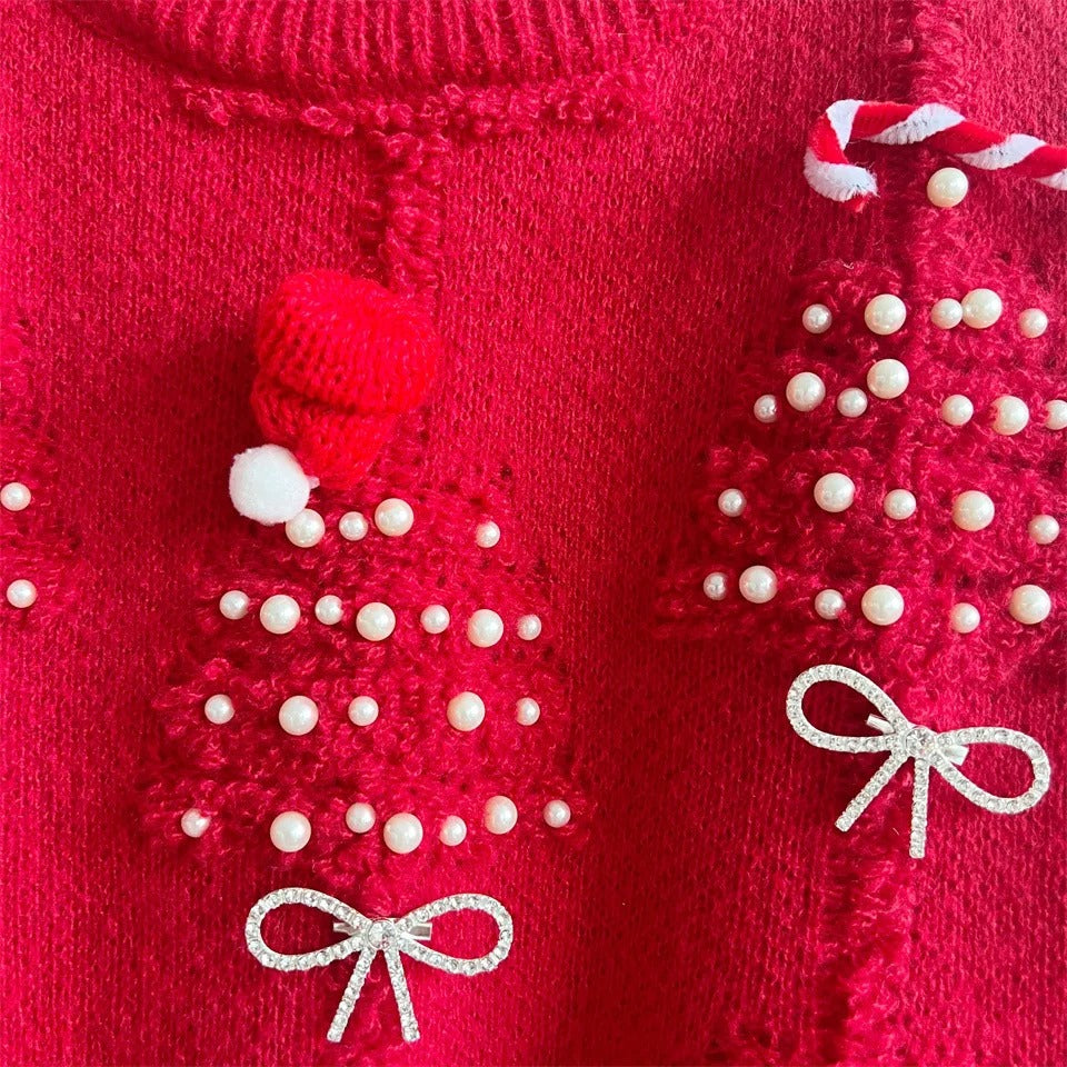 Rød julesweater til kvinder – med perledekorationer og sløjfedetaljer