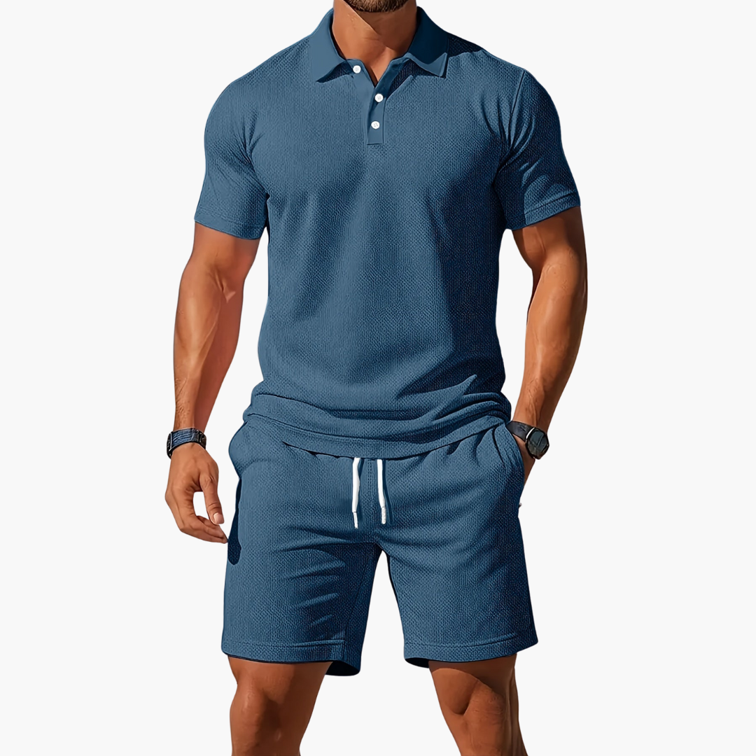 https://cdn.shopify.com/s/files/1/0943/0581/2804/files/mens-short-sleeve-polo-shirt-and-drawstring-shorts-2-piece-lounge-set-04.png?v=1775853795