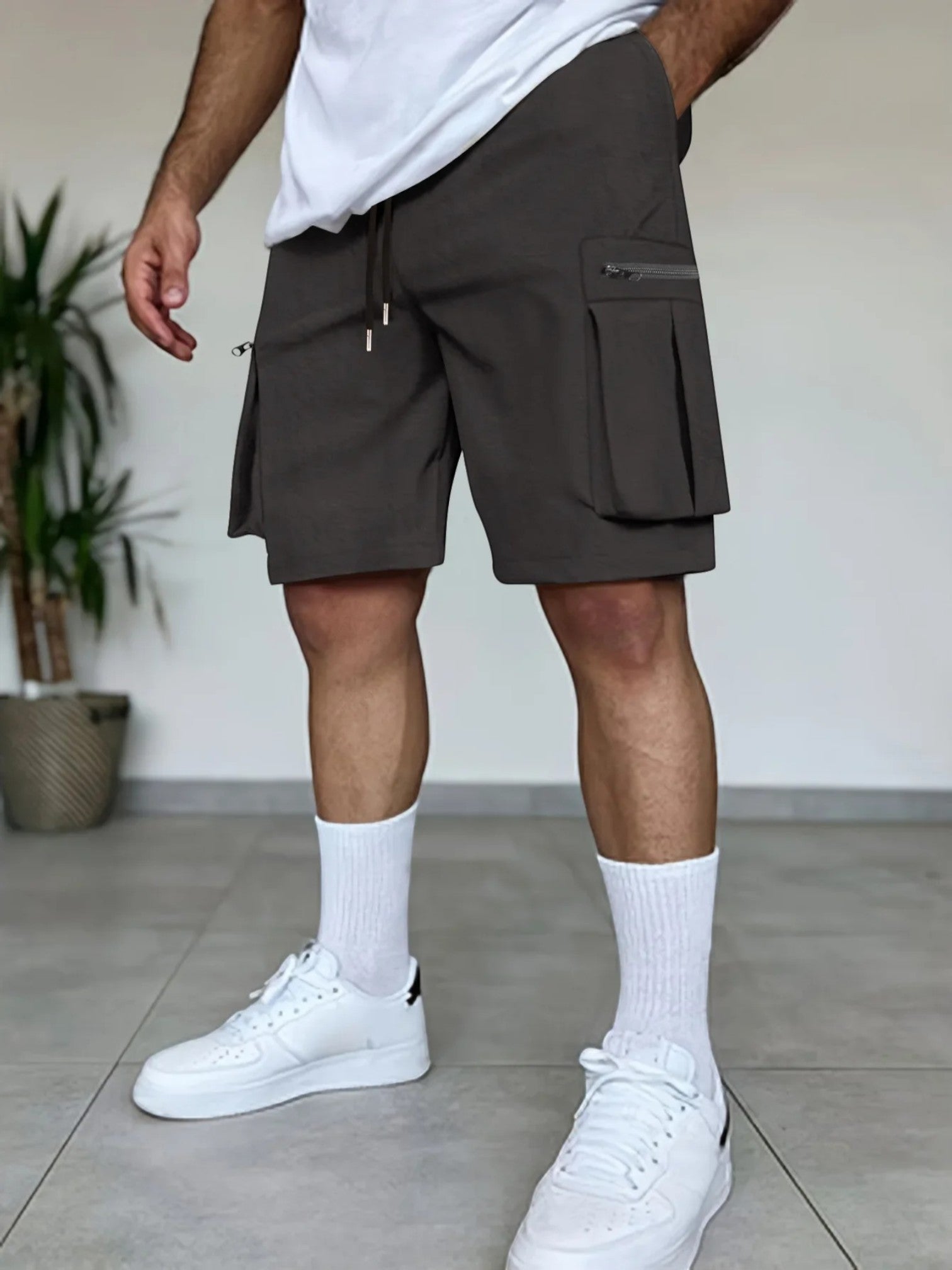 "Stoere lichtgewicht cargo shorts voor mannen, ademend katoenmix, meerdere zakken, ideaal voor zomeravonturen."