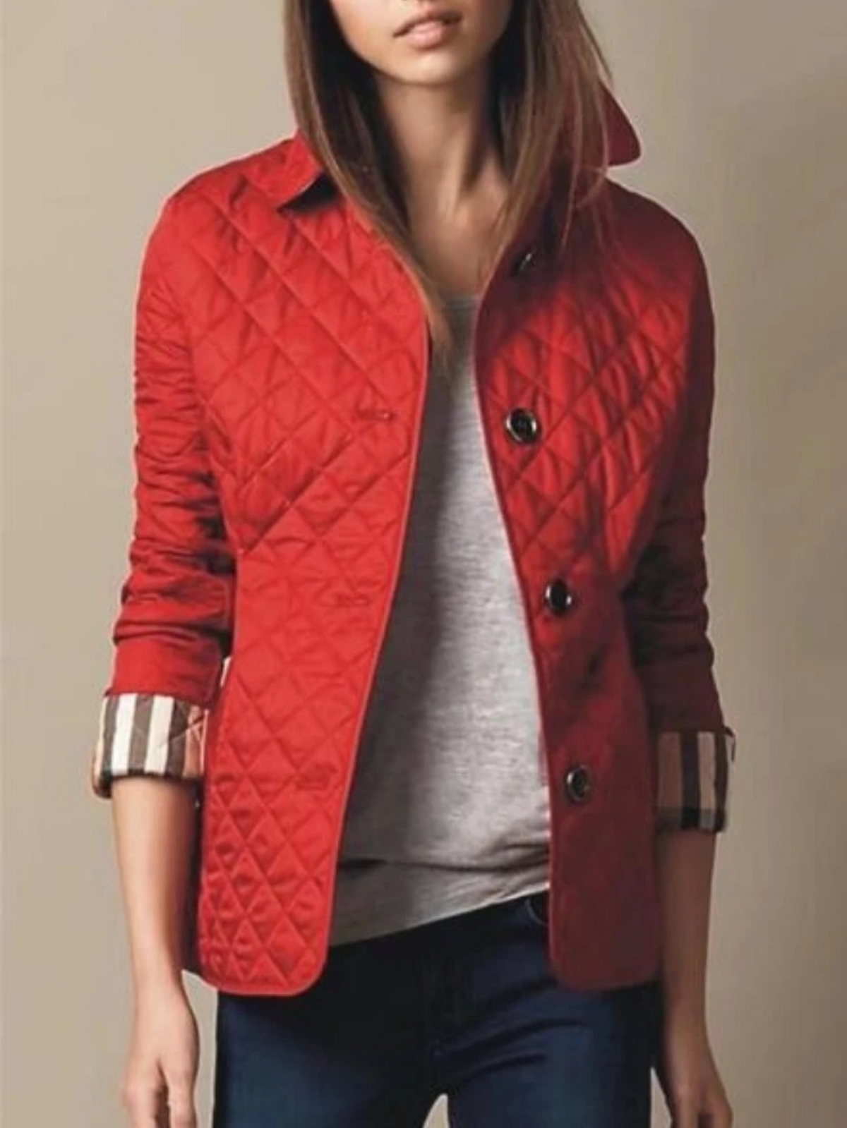 New autumn/winter ladies' fashion: a warm, casual quilted jacket with a trendy turned-down collar.