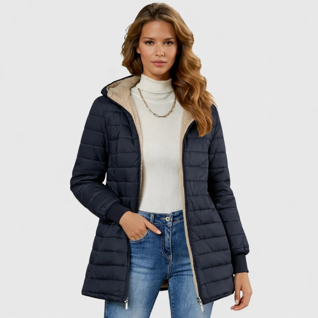 Blue sherpa-lined puffer trench coat, hood, ribbed cuffs.