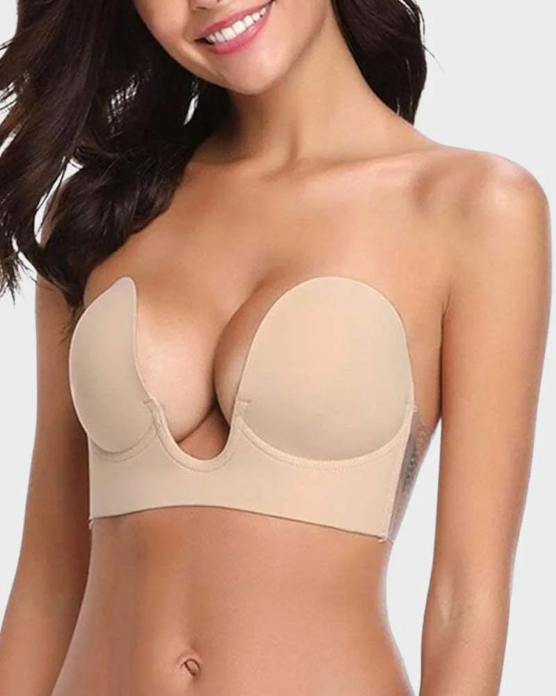 Strapless, backless, self-adhesive bra with push-up design and deep U-plunge front.
